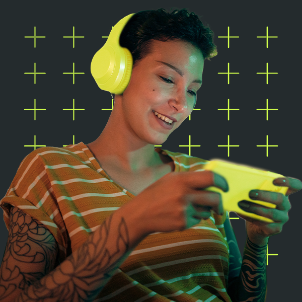 Young adult smiling at their phone