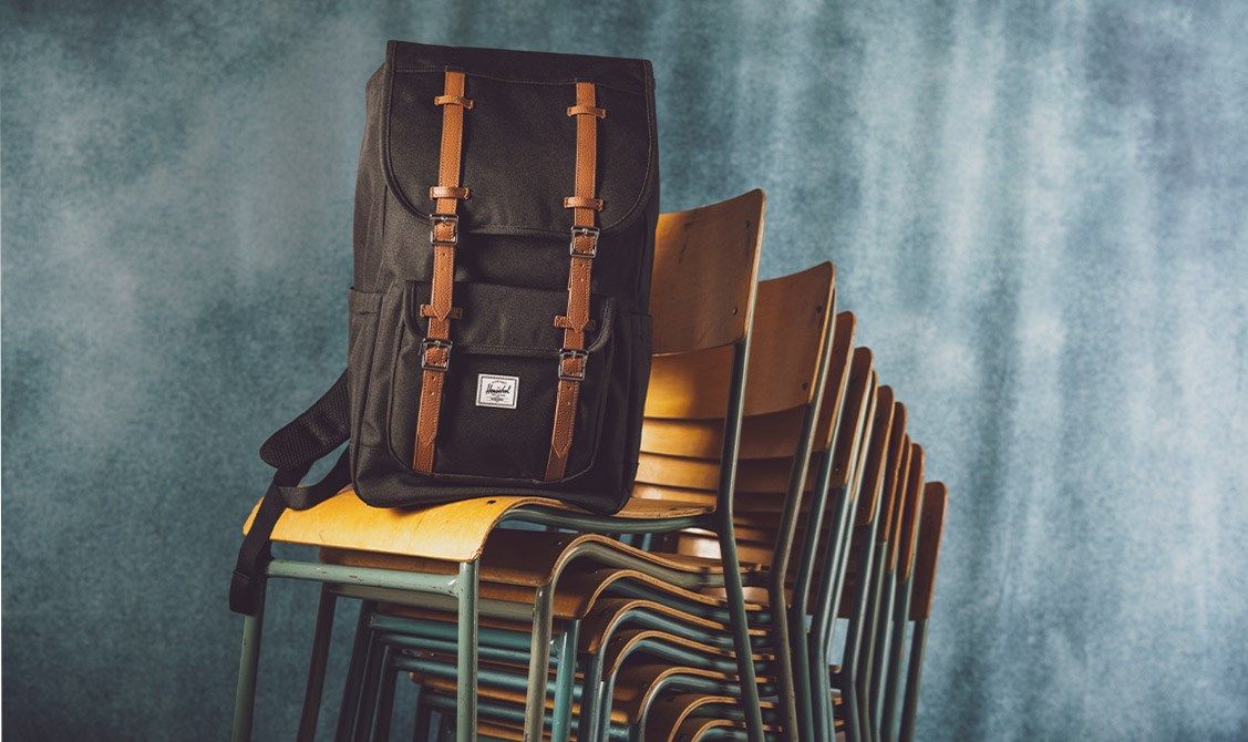 discount code for herschel backpacks Pop Quiz Backpack in Black & Tan The Herschel Supply DNA shoulder tab and internal label add a touch of personality Herschel Supply Co 10% Off